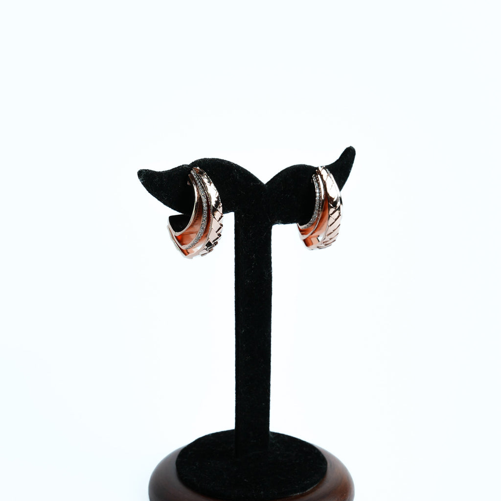 rose-gold hoop earring